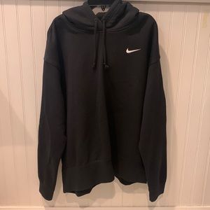 Nike woman’s medium hooded black sweatshirt.